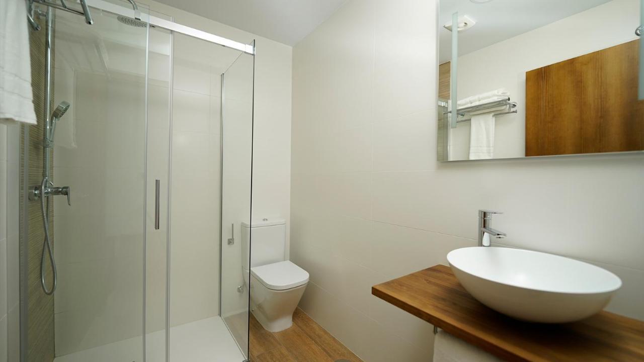 Apartamentos Puerta De Occidente Cornellana Eksteriør bilde