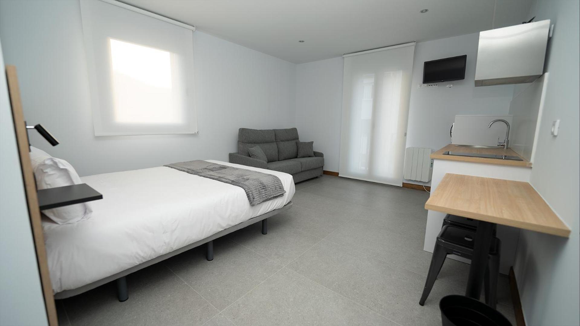 Apartamentos Puerta De Occidente Cornellana Eksteriør bilde