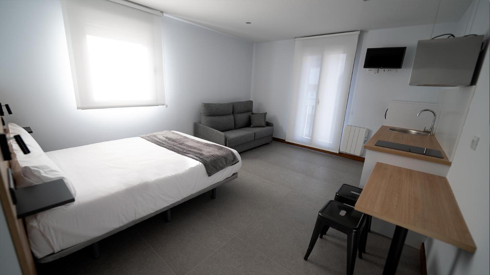 Apartamentos Puerta De Occidente Cornellana Eksteriør bilde